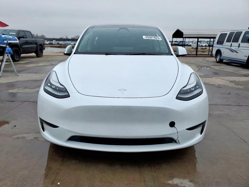 Photo 5 from auction – 2023 TESLA MODEL Y with VIN 7SAYGDEE6PA094052