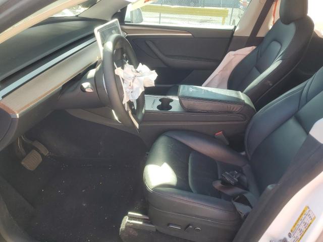 Photo 7 from auction – 2023 TESLA MODEL Y with VIN 7SAYGAEE1PF629628