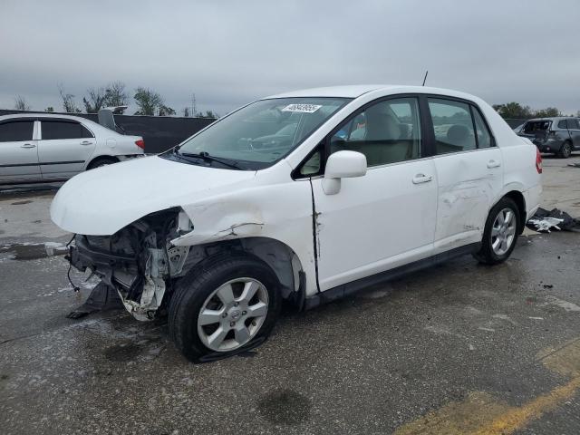 NISSAN VERSA S 2009 with VIN 3N1BC11E09L352045 - Photo from auction