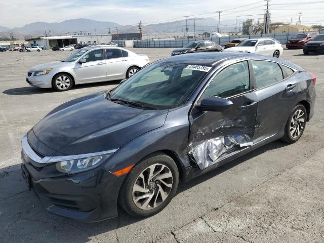 HONDA CIVIC EX 2018 with VIN 2HGFC2F7XJH522540 - Photo from auction