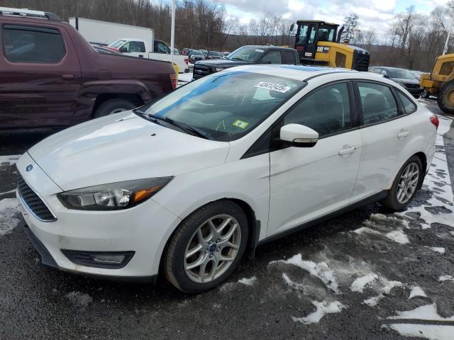 FORD FOCUS SE 2015 with VIN 1FADP3F29FL303797 - Photo from auction