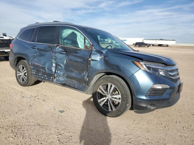 Фото 4 с аукциона – 2018 HONDA PILOT EXLN с VIN 5FNYF6H75JB045802
