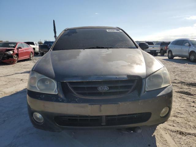 Photo 5 from auction – 2004 KIA SPECTRA LX with VIN KNAFE121745055316