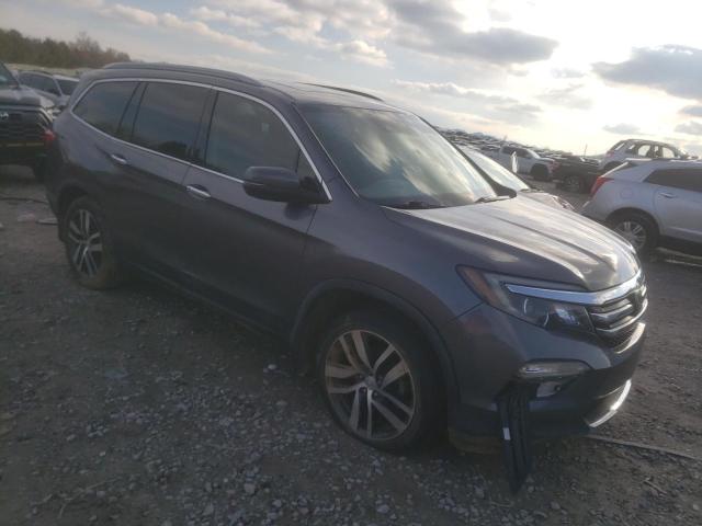 Photo 4 from auction – 2016 HONDA PILOT ELIT with VIN 5FNYF6H03GB112022