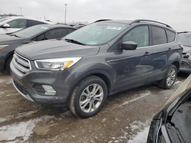 FORD ESCAPE SE 2018 with VIN 1FMCU9GD2JUB29233 - Photo from auction