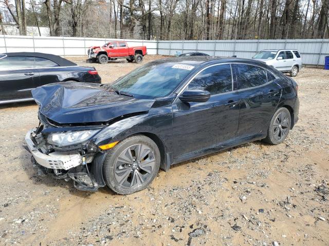 HONDA CIVIC EXL 2018 with VIN SHHFK7H85JU201014 - Photo from auction