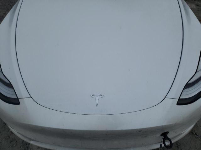Photo 11 from auction – 2021 TESLA MODEL Y with VIN 5YJYGDEE0MF122438