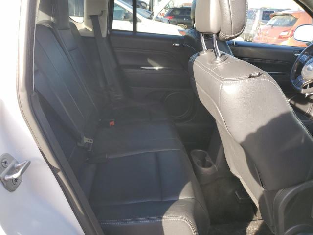 Photo 11 from auction – 2014 JEEP COMPASS LA with VIN 1C4NJCEA6ED679438