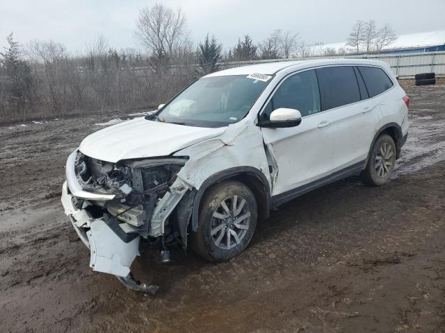 HONDA PILOT EX 2021 with VIN 5FNYF6H34MB022447 - Photo from auction