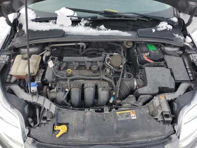 Photo 11 from auction – 2014 FORD FOCUS SE with VIN 1FADP3K29EL226594