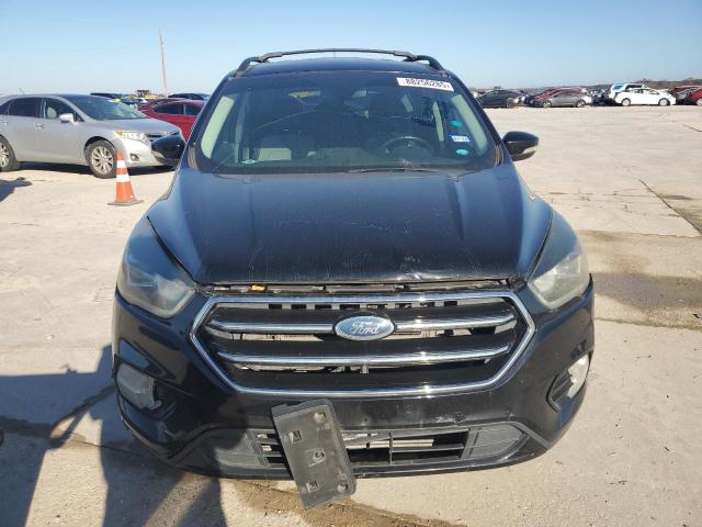 Photo 5 from auction – 2017 FORD ESCAPE TIT with VIN 1FMCU0J95HUA57809