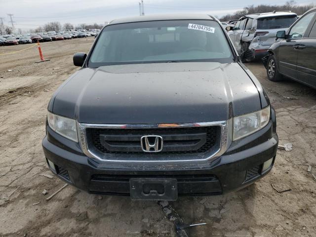 Photo 5 from auction – 2011 HONDA RIDGELINE with VIN 5FPYK1F20BB006775