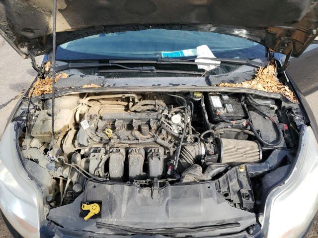 Foto 11 de la subasta – 2014 FORD FOCUS S con VIN 1FADP3E23EL407881