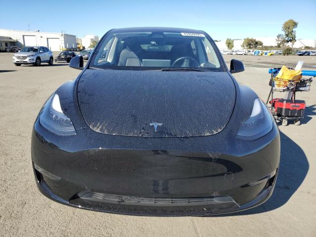 Photo 5 from auction – 2023 TESLA MODEL Y with VIN 7SAYGAEE9PF900760