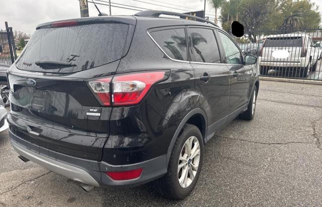 Photo 4 from auction – 2018 FORD ESCAPE SE with VIN 1FMCU0GD9JUC36940