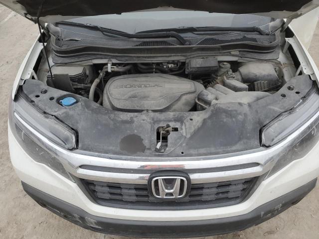 Photo 11 from auction – 2019 HONDA RIDGELINE with VIN 5FPYK3F65KB008827