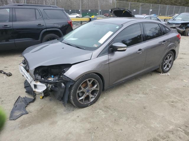 FORD FOCUS SE 2014 with VIN 1FADP3F22EL355612 - Photo from auction