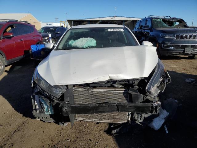 Photo 5 from auction – 2022 KIA FORTE FE with VIN 3KPF24ADXNE462528