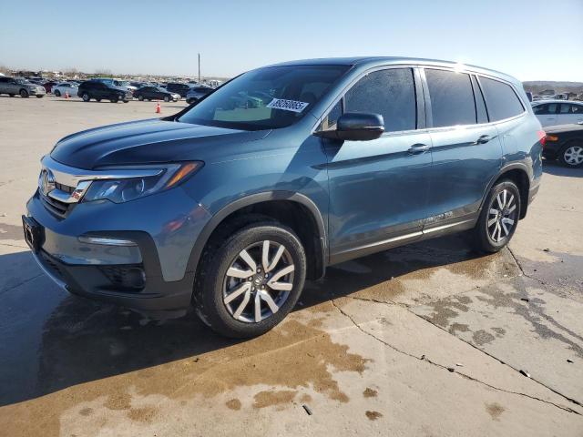 HONDA PILOT EXL 2022 with VIN 5FNYF5H55NB005170 - Photo from auction