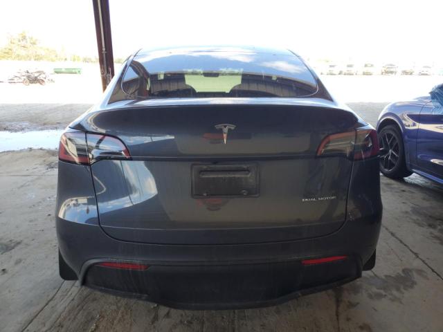 Photo 6 from auction – 2023 TESLA MODEL Y with VIN 7SAYGDEE4PF865210