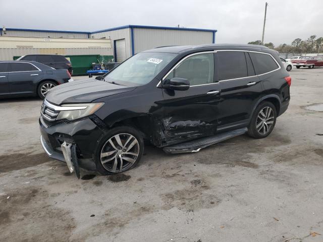 HONDA PILOT TOUR 2017 with VIN 5FNYF6H91HB024411 - Photo from auction