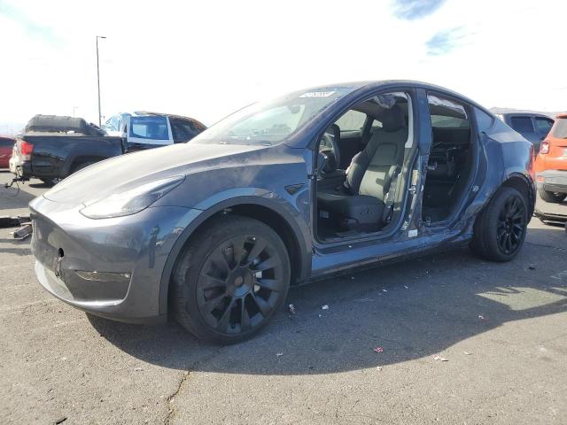 TESLA MODEL Y 2023 with VIN 7SAYGDEE8PF912853 - Photo from auction