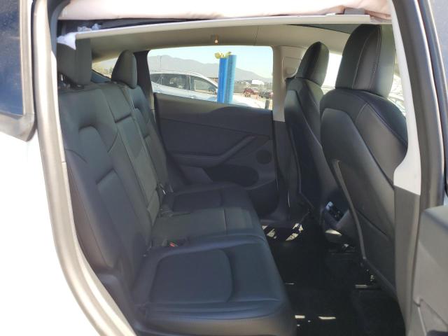Photo 10 from auction – 2023 TESLA MODEL Y with VIN 7SAYGAEE6PF614509