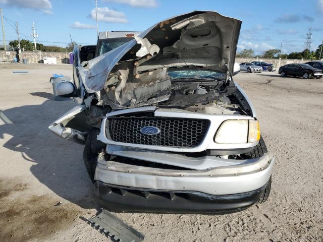 Photo 5 from auction – 2003 FORD F150 with VIN 1FTRX07283KD73550