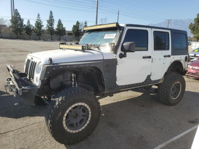 JEEP WRANGLER U 2014 with VIN 1C4BJWDG8EL179037 - Photo from auction