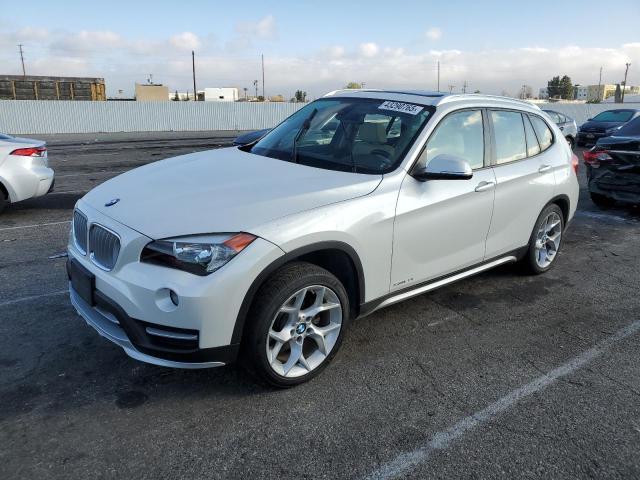 BMW X1 SDRIVE2 2015 with VIN WBAVM1C55FV317501 - Photo from auction