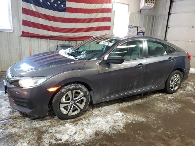 HONDA CIVIC LX 2016 with VIN 19XFC2F58GE217328 - Photo from auction