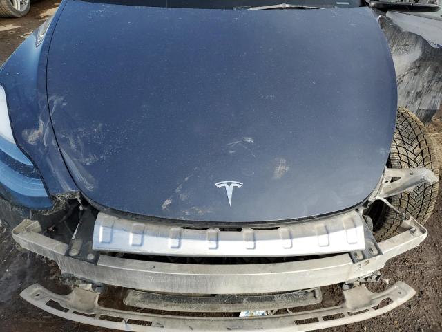 Photo 11 from auction – 2023 TESLA MODEL Y with VIN 7SAYGDEE4PA090968