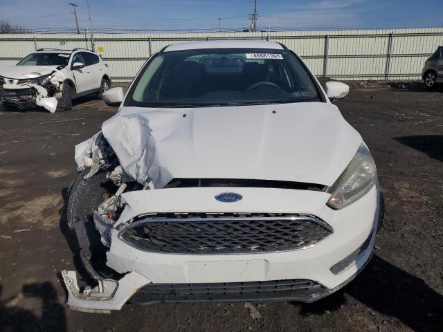 Photo 5 from auction – 2016 FORD FOCUS SE with VIN 1FADP3F23GL251035