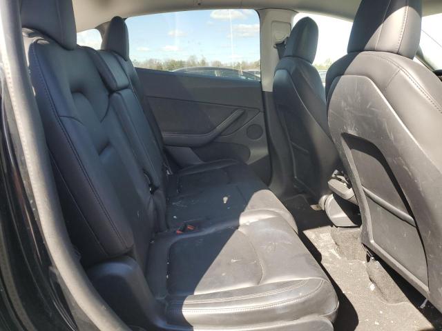 Photo 11 from auction – 2021 TESLA MODEL Y with VIN 5YJYGAEE4MF149141