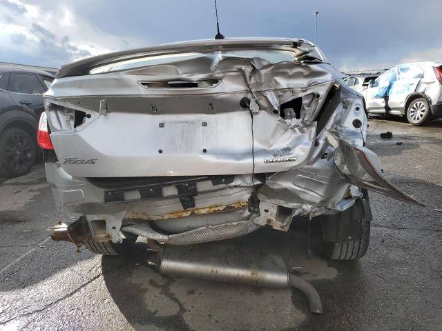 Foto 6 de la subasta – 2013 FORD FOCUS SE con VIN 1FADP3F21DL255113