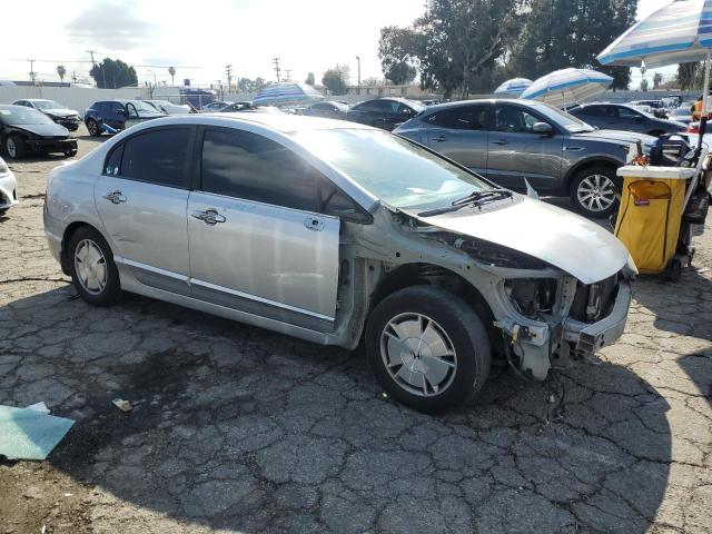 Photo 4 from auction – 2010 HONDA CIVIC HYBR with VIN JHMFA3F29AS006255