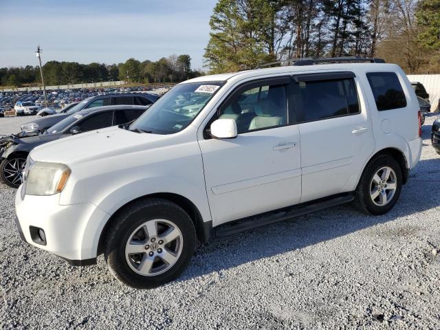 HONDA PILOT EXL 2011 with VIN 5FNYF4H52BB075750 - Photo from auction