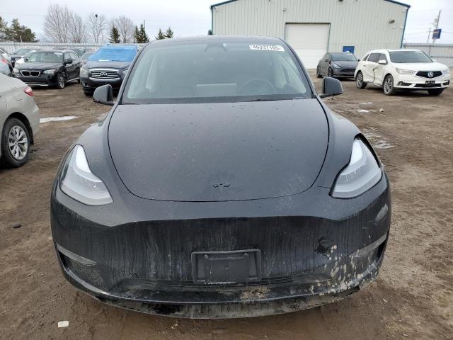 Photo 5 from auction – 2022 TESLA MODEL Y with VIN 7SAYGDEF5NF512464
