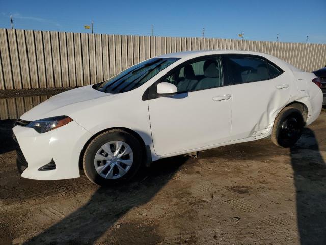 TOYOTA COROLLA L 2017 with VIN 5YFBURHE8HP662234 - Photo from auction