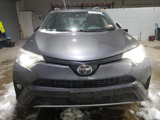Photo 5 from auction – 2018 TOYOTA RAV4 SE with VIN JTMJFREV5JJ210827