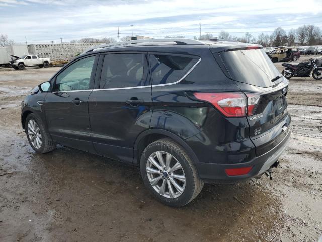Photo 2 from auction – 2017 FORD ESCAPE TIT with VIN 1FMCU0JD5HUD75210