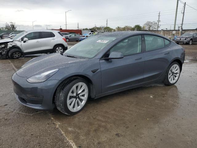 TESLA MODEL 3 2022 with VIN 5YJ3E1EA3NF289065 - Photo from auction