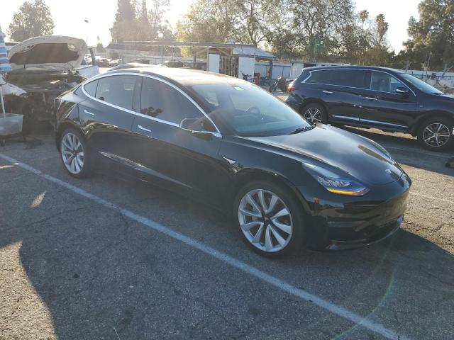 Photo 4 from auction – 2018 TESLA MODEL 3 with VIN 5YJ3E1EA9JF019803
