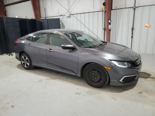 Photo 4 from auction – 2021 HONDA CIVIC LX with VIN 2HGFC2F63MH504845