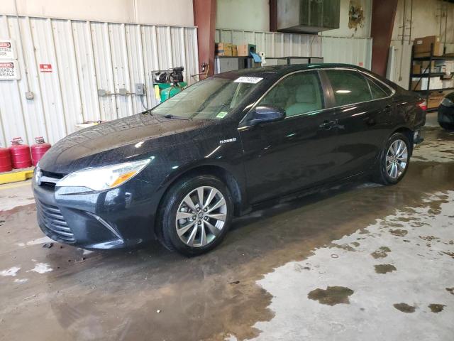 TOYOTA CAMRY HYBR 2015 with VIN 4T1BD1FK0FU166558 - Photo from auction