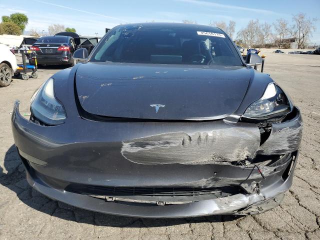 Снимка 5 от търг – 2018 TESLA MODEL 3 с VIN 5YJ3E1EA5JF052748