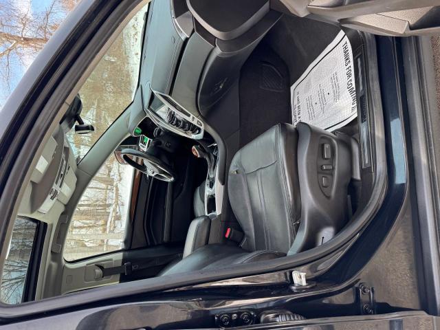 Photo 5 from auction – 2013 CADILLAC SRX PERFOR with VIN 3GYFNHE3XDS564132