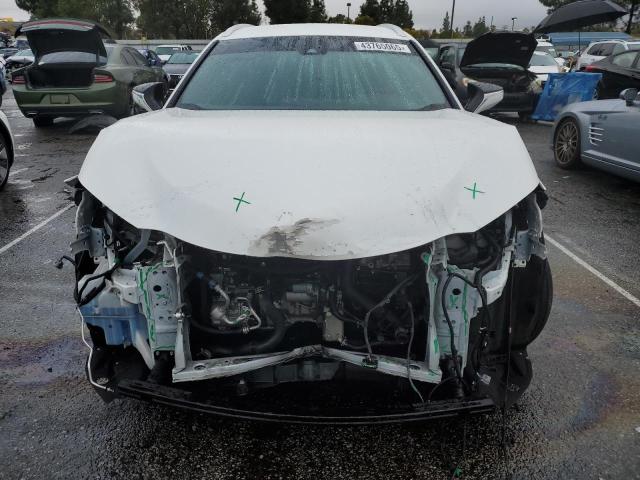 Photo 5 from auction – 2021 LEXUS UX 200 with VIN JTHX3JBH3M2041505