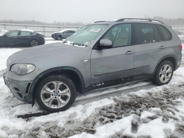 BMW X5 XDRIVE5 2011 with VIN 5UXZV8C52BLL67951 - Photo from auction