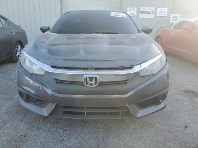 Photo 5 from auction – 2016 HONDA CIVIC LX with VIN 19XFC2F65GE038706